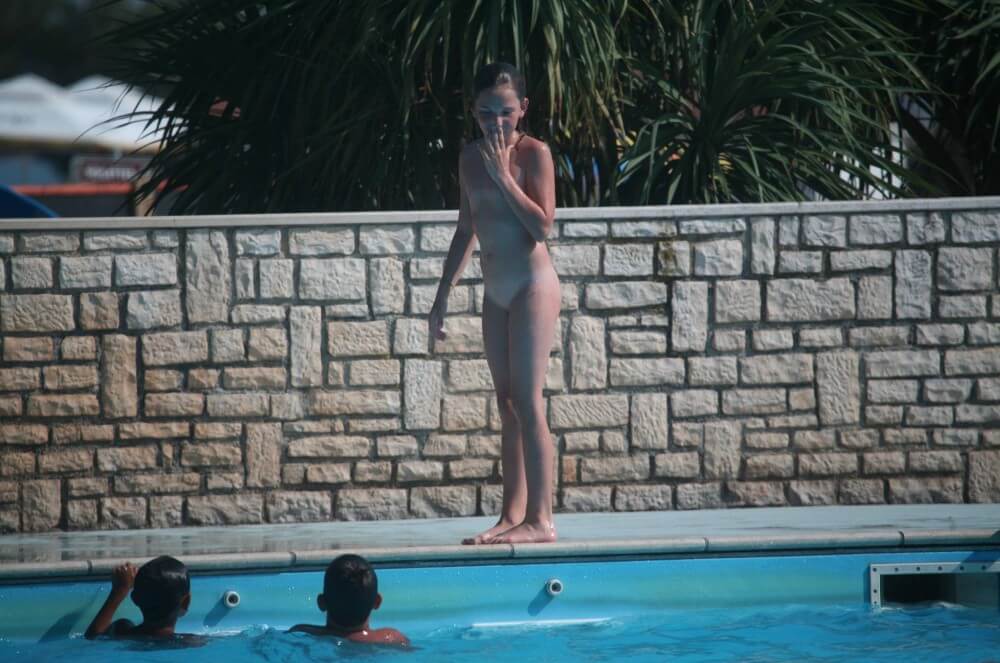 Naturist Pool-Side Singles photos - People practice nudism to achieve harmony with nature