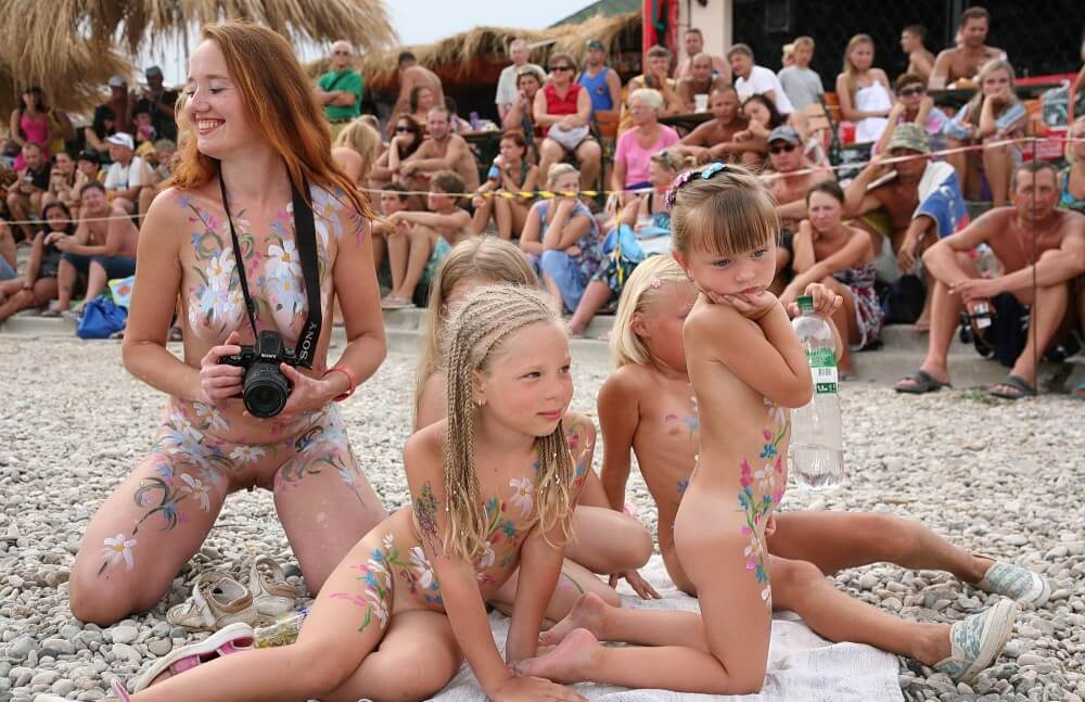 Warm Sand Relaxation photos - Nudism and naturism value harmony and balance