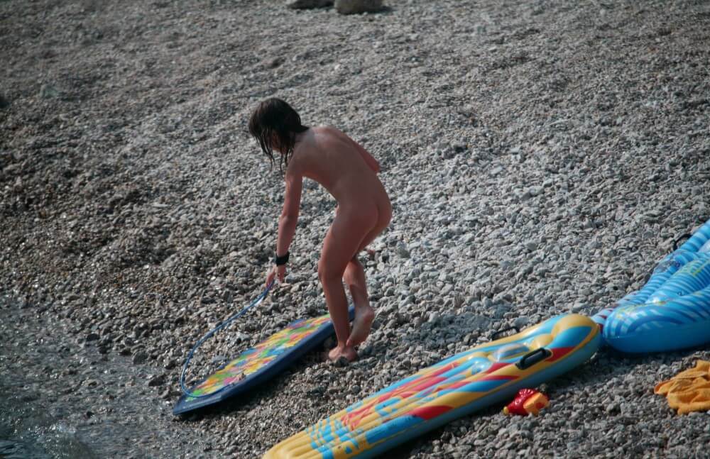 Naturist Surf Board Glides pics - Ordinary people as naturists