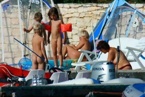 By the boat photos - The practice of naturism fosters inner harmony