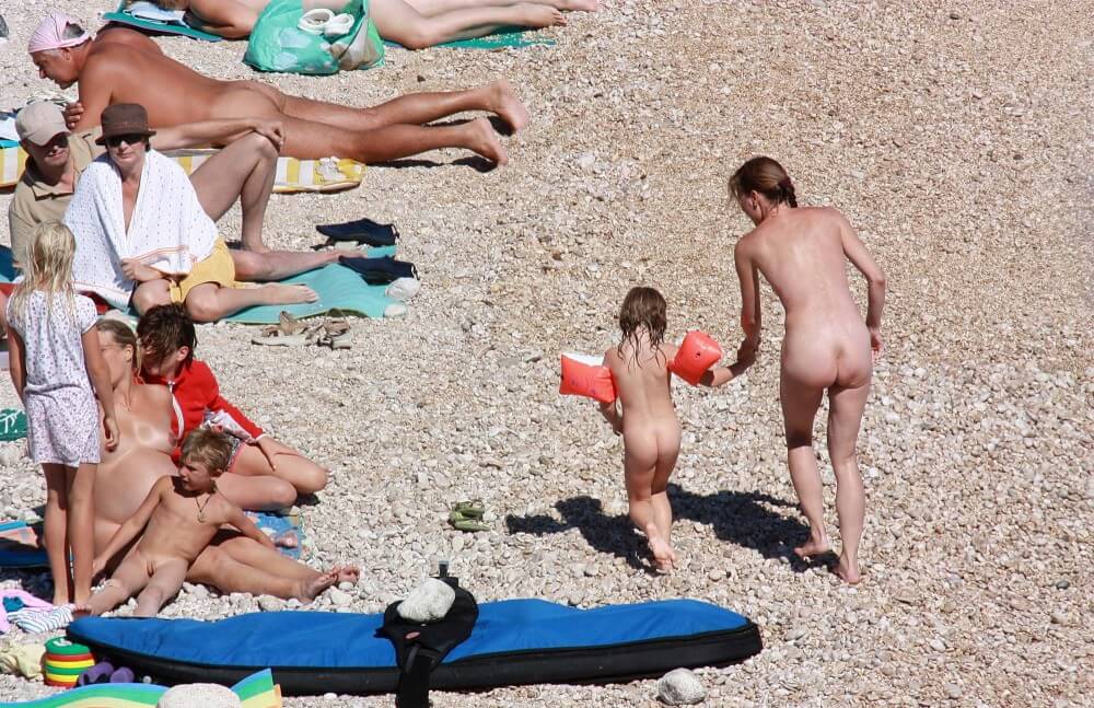Orange Floaty Safety First Naturist pics - Nudism and naturism are a path to natural harmony and inner wholeness